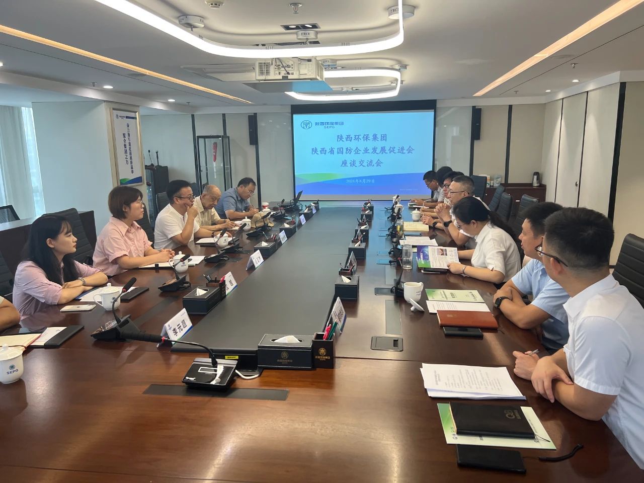 优发国际集团与陕西省国防企业生长增进会座谈交流